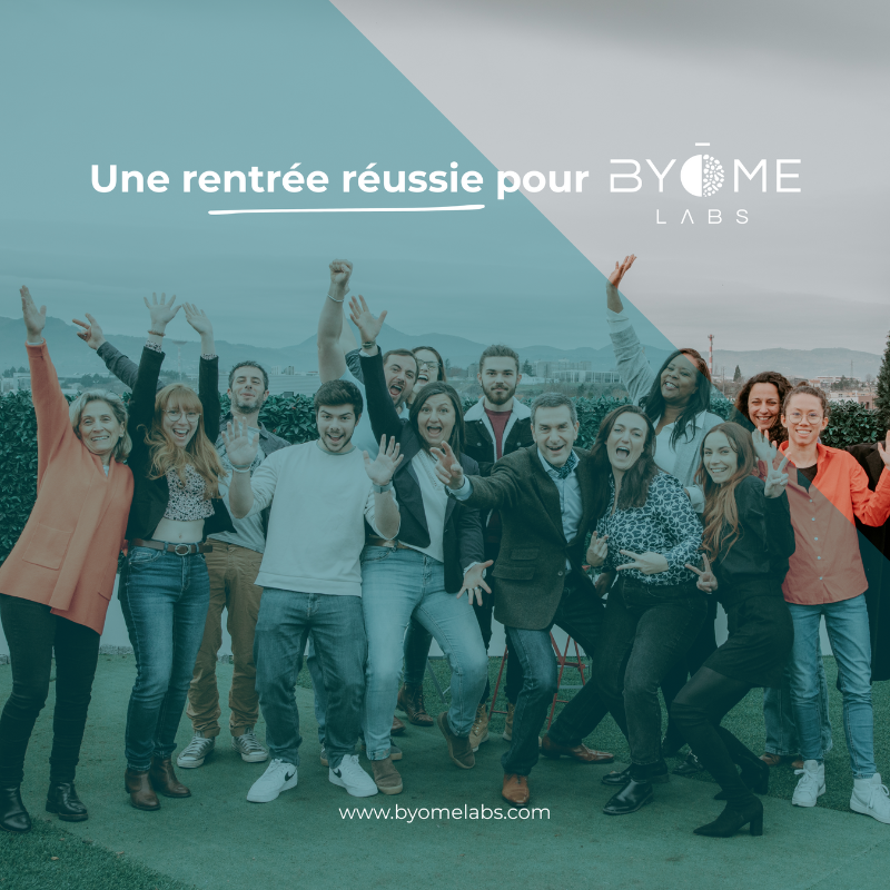 Équipe heureuse célébrant rentrée réussie Byome Labs.